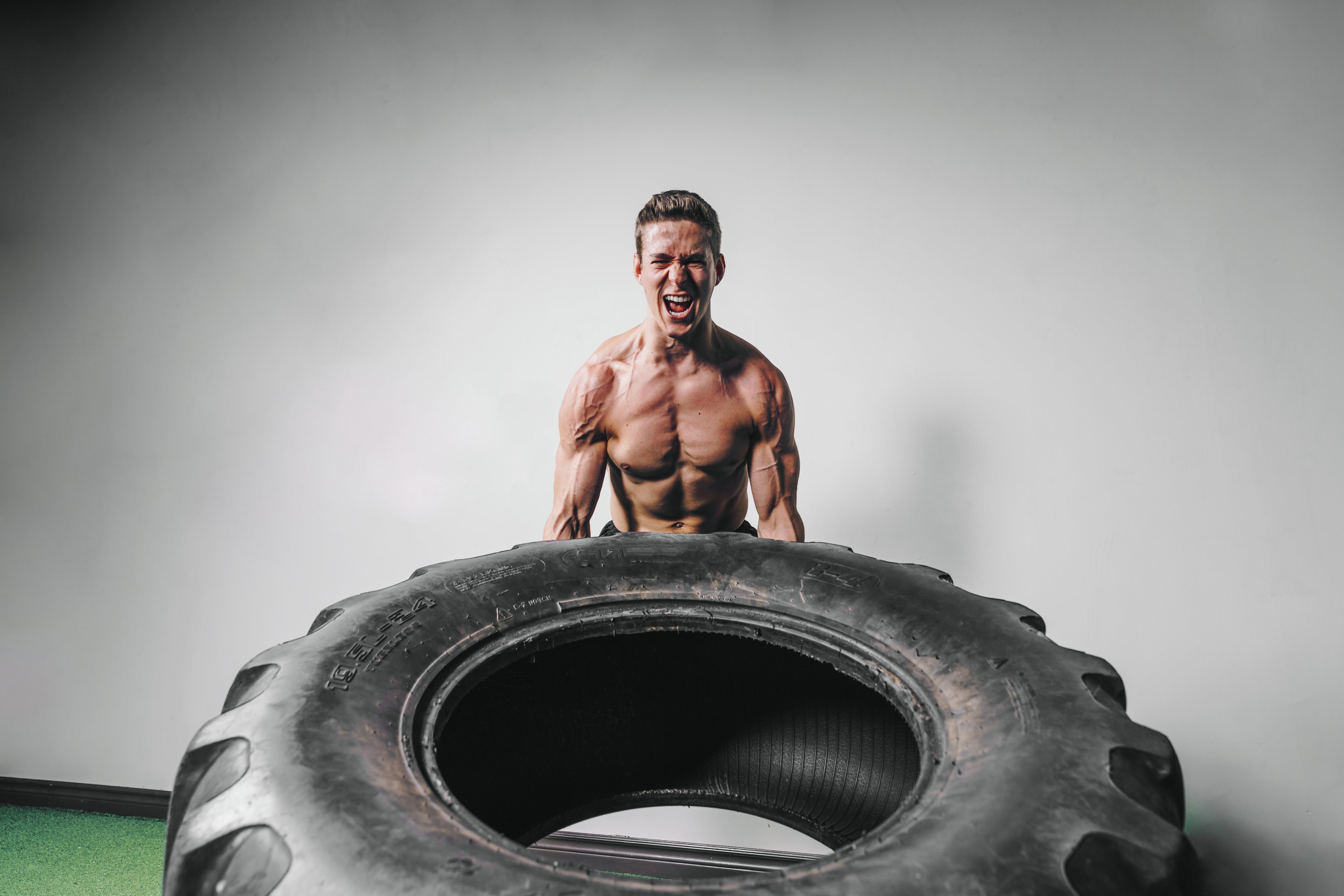 files/man-lifts-tire-exercise.jpg